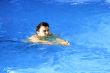 man swimming during a competition