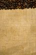Background of the roasted coffee beans and burlap
