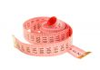Curled pink measuring tape