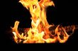 Red flame on the black background