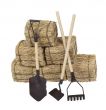 Tools Leaning on a Stack of Hay
