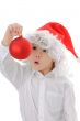 child in a hat santa claus