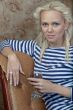 A girl with a glass of wine