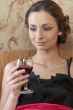A girl with a glass of wine