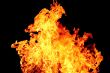 Red flame on the black background
