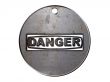 3d danger sign, in metal medallion on a white isolated background.