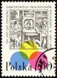 Medieval printing office on post stamp