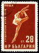 Dancing young woman on post stamp