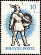 Ancient warrior with sword on post stamp