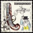 Ancient pistol on post stamp
