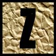 One letter of paper alphabet