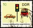 Post stamp with car, truck and light signal