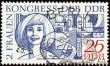 Portrait of young woman on post stamp