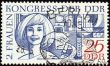 Portrait of young woman on post stamp