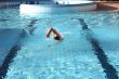 swim the crawl in swimming pool