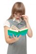 Young girl reads english and wonders