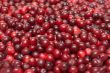 Cranberries put by background