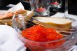 Red caviar in a glass plate 