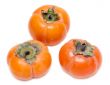 Three ripe persimmons