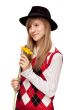 Girl with flower in black hat