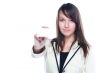 Young business woman with a business card