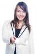 Young business woman with a business card