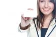 Young business woman with a business card