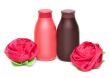 Two vials of the shampoo and sponge in form of the rose