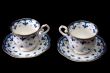 Two tea cups on saucer