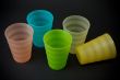 Colour plastic glasses on dark background