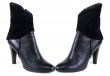Black feminine leather boots with suede insertion