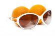 Sunglasses and two oranges