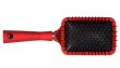 One red massages comb