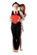 Two girls with red cardboard heart