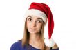 Beautiful girl in red Santa hat
