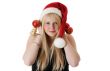 Young beautiful girl in a Santa hat