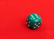 Green plastic dice