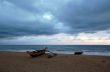 Empty Beach on Cloudy Day at Sunset