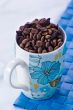 Coffee beans with chunks of dark chocolate