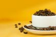 Cup full with coffee beans