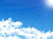 blue sky background with tiny clouds