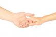 Shaking hands of two people, man and woman, isolated on white.