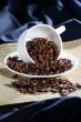 The inverted cup with coffee beans