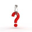 figure sitting on a question mark