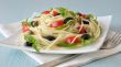 Spaghetti with tomato, capers and basil with olives