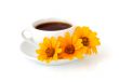 A cup of coffee with flowers
