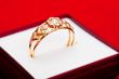 Gold ring with white zirconia enchased