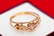 Gold ring with white zirconia enchased