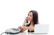 Secretary girl with an old phone and laptop