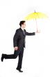 Business man with an umbrella